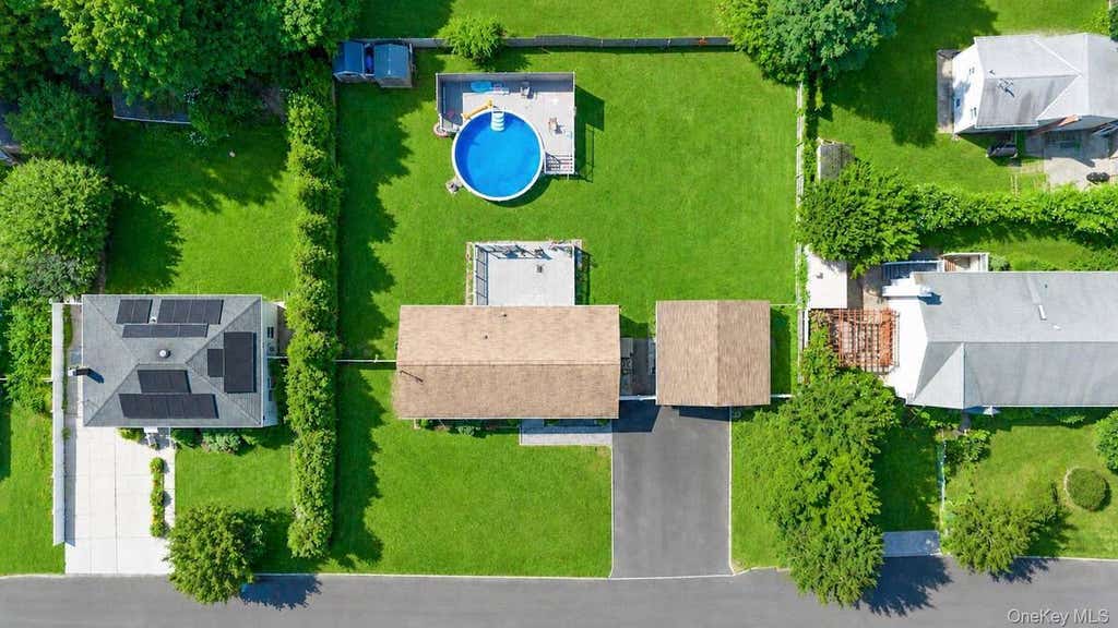 Photo of 28 Mapleton Avenue, Farmingville, NY 11738 (MLS # 11933107)