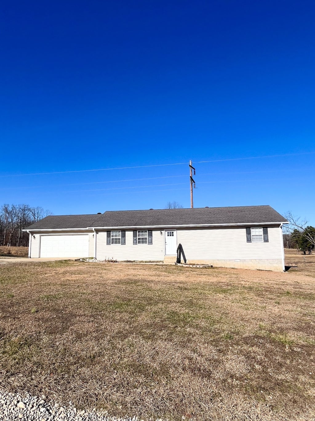 Photo of 318 Shadow Rock Lake Rd, Poplar Bluff, MO 63901 (MLS # 11933284)