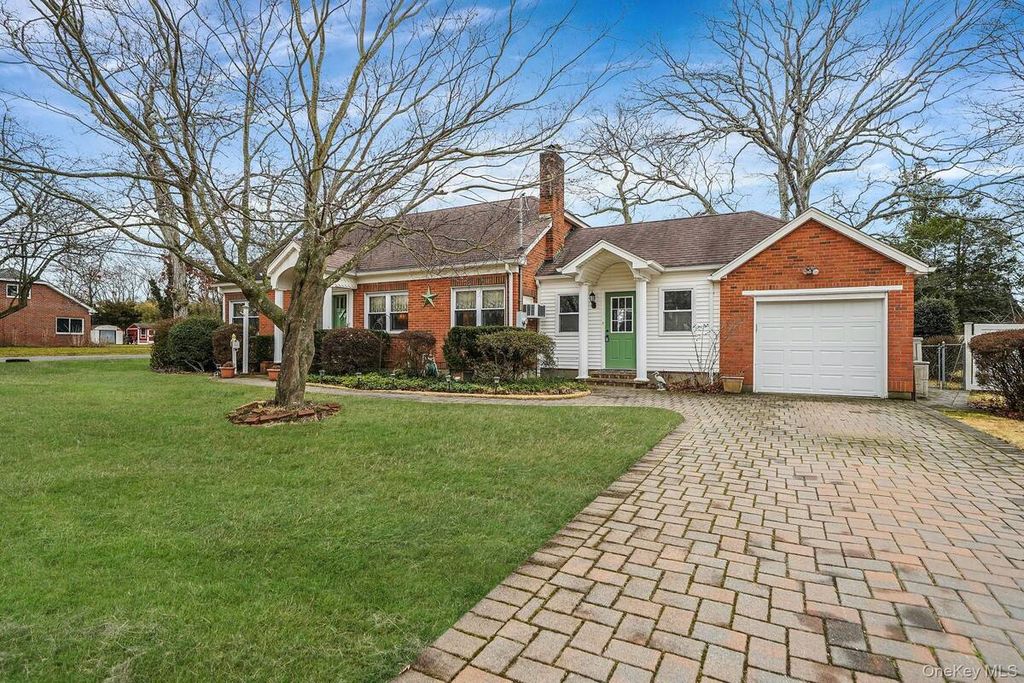 Photo of 64 John Street, Patchogue, NY 11772 (MLS # 11680830)