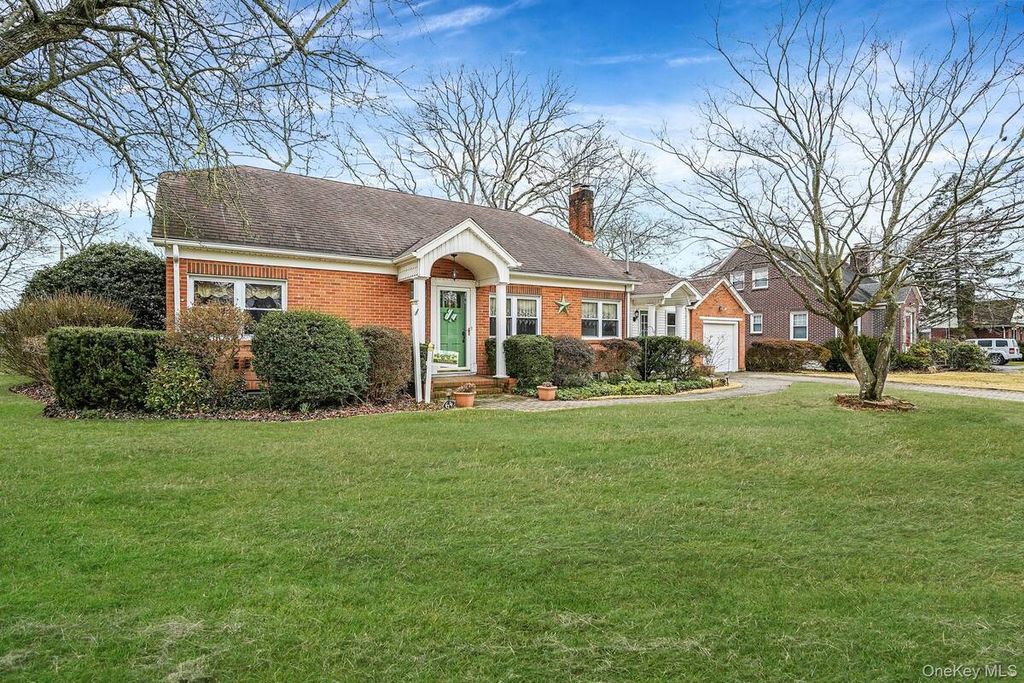 Photo of 64 John Street, Patchogue, NY 11772 (MLS # 11680830)