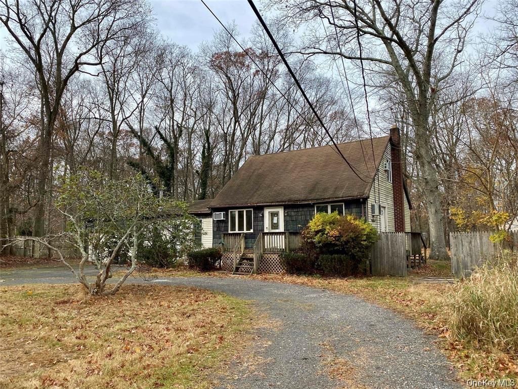 Photo of 26 N Swezeytown Road, Middle Island, NY 11953 (MLS # 11623473)