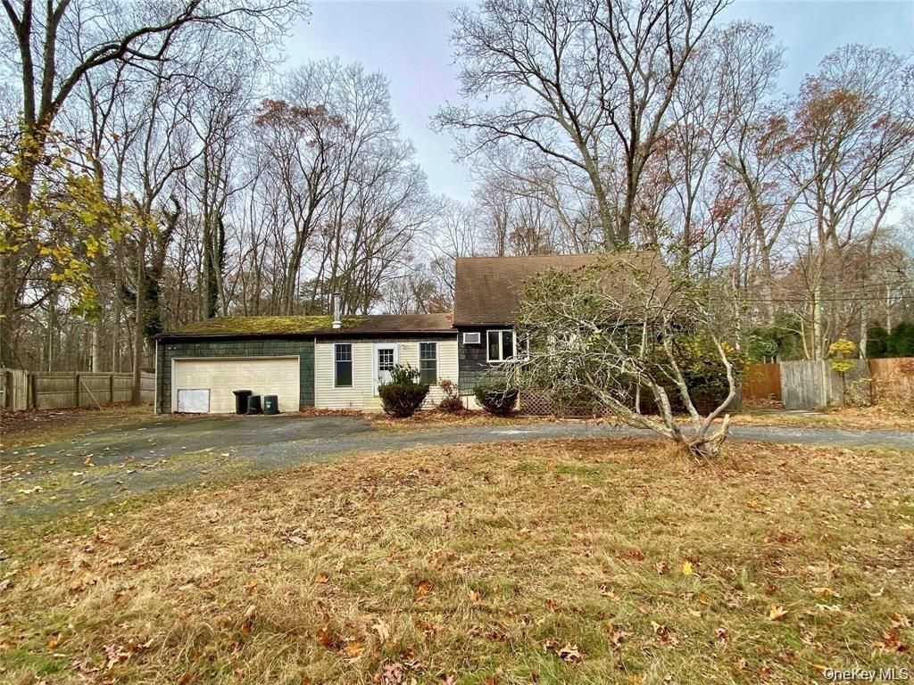 Photo of 26 N Swezeytown Road, Middle Island, NY 11953 (MLS # 11623473)