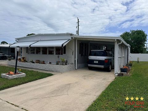 Photo of 184 Tanglewood Ave, Port Orange, FL 32127 (MLS # 11686199)