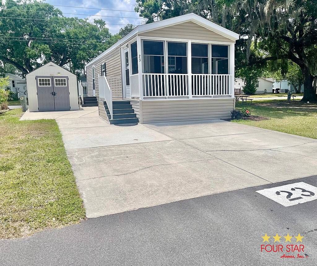Photo of 5300 W Irlo Bronson Hwy #23, Kissimmee, FL 34746 (MLS # 11775423)