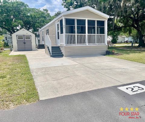 Photo of 5300 W Irlo Bronson Hwy #23, Kissimmee, FL 34746 (MLS # 11775423)
