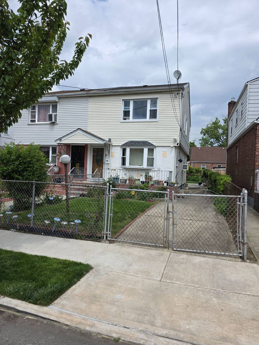 Photo of 12023 194th Street, Saint Albans, NY 11412 (MLS # 11775212)