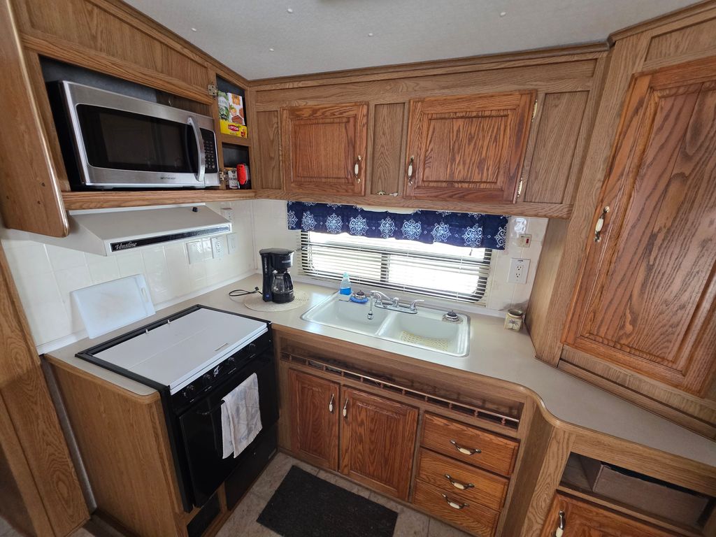 Photo of 34631 Nancy St, Zephyrhills, FL 33541 (MLS # 11679761)