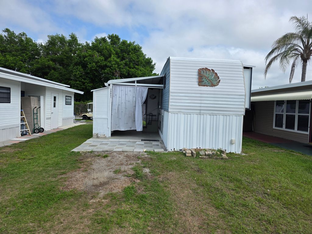 Photo of 34631 Nancy St, Zephyrhills, FL 33541 (MLS # 11679761)