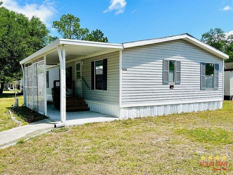 Photo of 1690 Timber Ridge Cir, Leesburg, FL 34748 (MLS # 11737131)