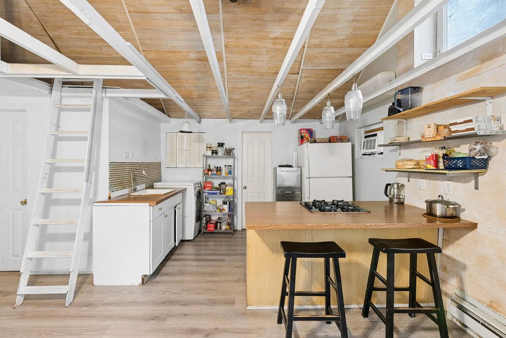 Photo of 10 Indian Rd, Hampton Bays, NY 11946 (MLS # 11675707)