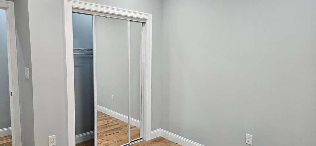 Photo of 10827 171st Pl, Jamaica, NY 11433 (MLS # 11824652)