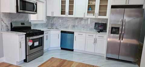Photo of 10827 171st Pl, Jamaica, NY 11433 (MLS # 11824652)