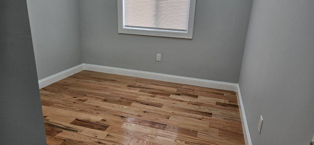 Photo of 10827 171st Pl, Jamaica, NY 11433 (MLS # 11824652)