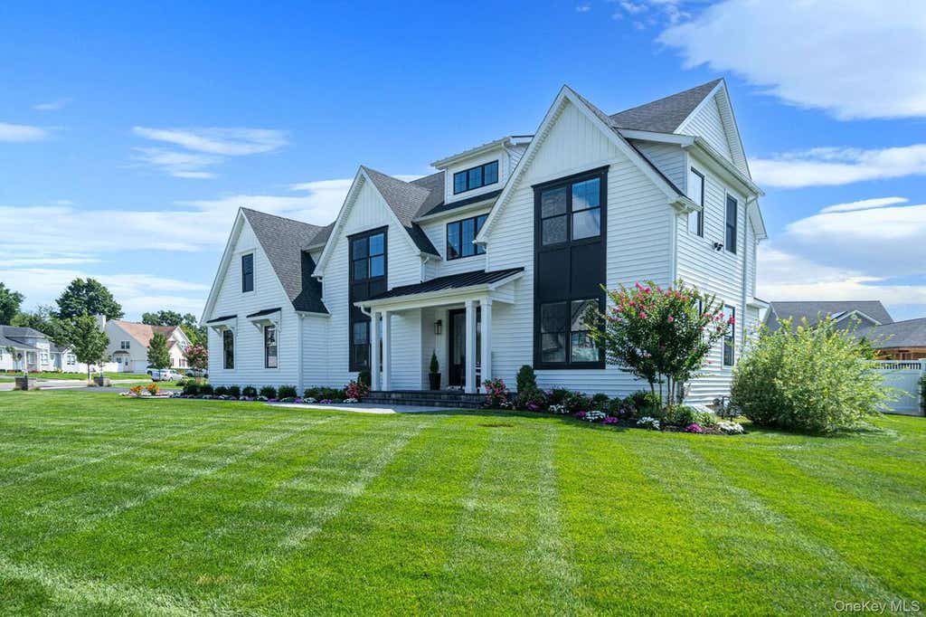 Photo of 53 Southview Circle, Lake Grove, NY 11755 (MLS # 11931060)
