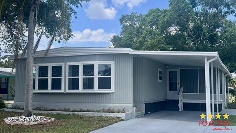 Photo of 14627 Pebble Beach Blvd, Orlando, FL 32826 (MLS # 11695200)