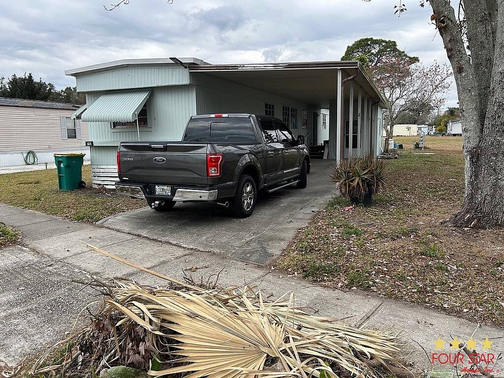 Photo of 751 Footbridge Dr, Melbourne, FL 32934 (MLS # 11651513)