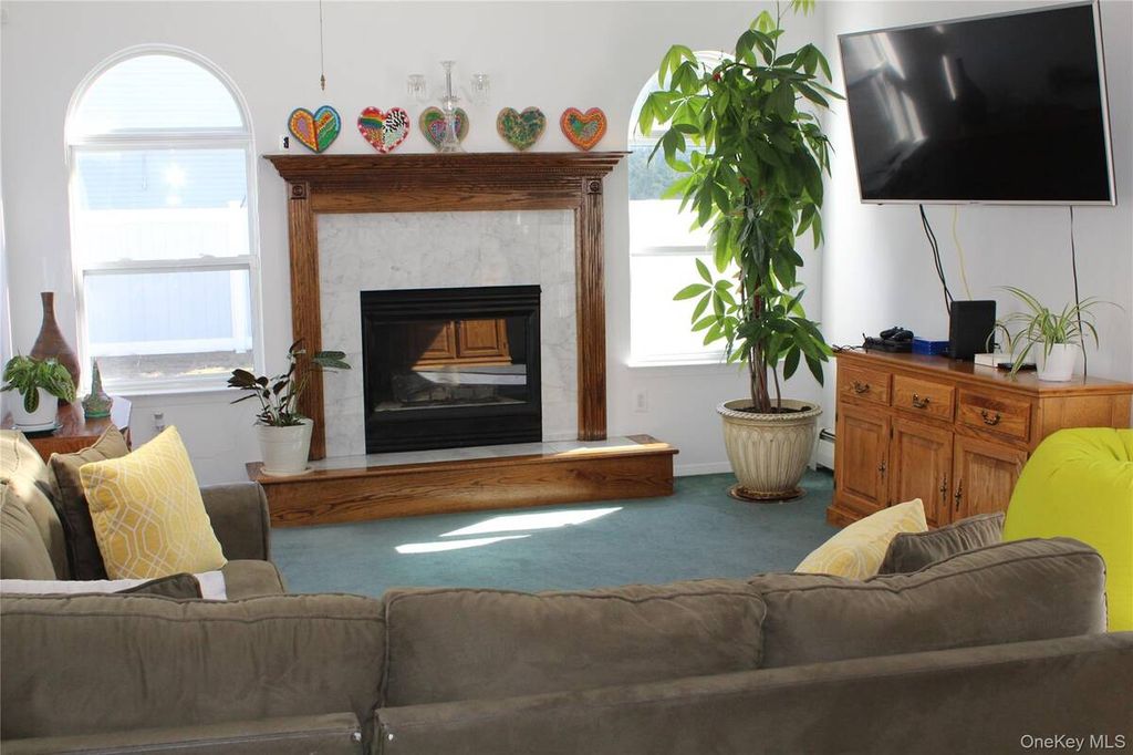 Photo of 87 N Howell Avenue, Centereach, NY 11720 (MLS # 11682158)