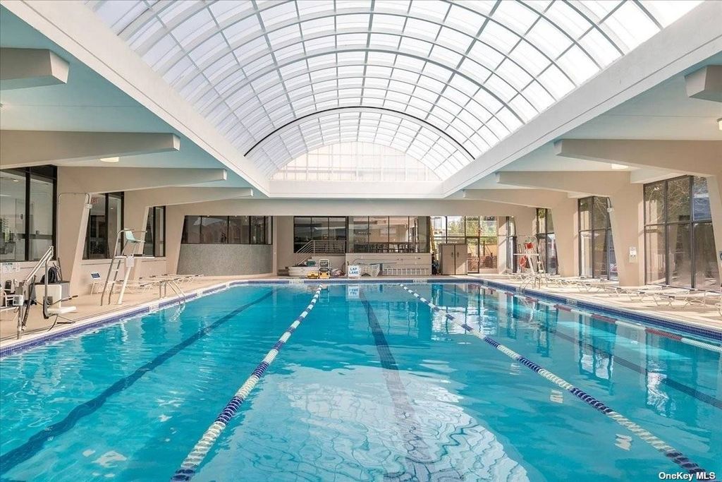 Photo of 1 Bay Club Dr #10U, Bayside, NY 11360 (MLS # 11610272)