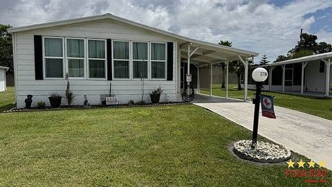 Photo of 1780 Walden Pond DR, Fort Pierce, FL 34945 (MLS # 11824610)