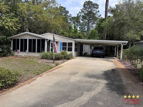 Photo of 2976 Turtle Dove Trl, DeLand, FL 32724 (MLS # 11694360)