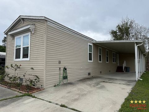 Photo of 152 Durham Cir #152, Kissimmee, FL 34746 (MLS # 11674475)