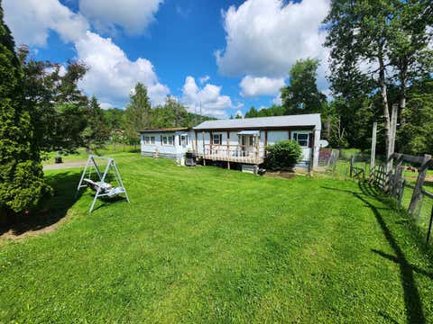 Photo of 108 Simons Spur Road, Smyrna, NY 13464 (MLS # 11870546)