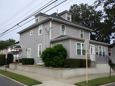 Photo of 55 Fulton St, Westbury, NY 11590 (MLS # 11658879)