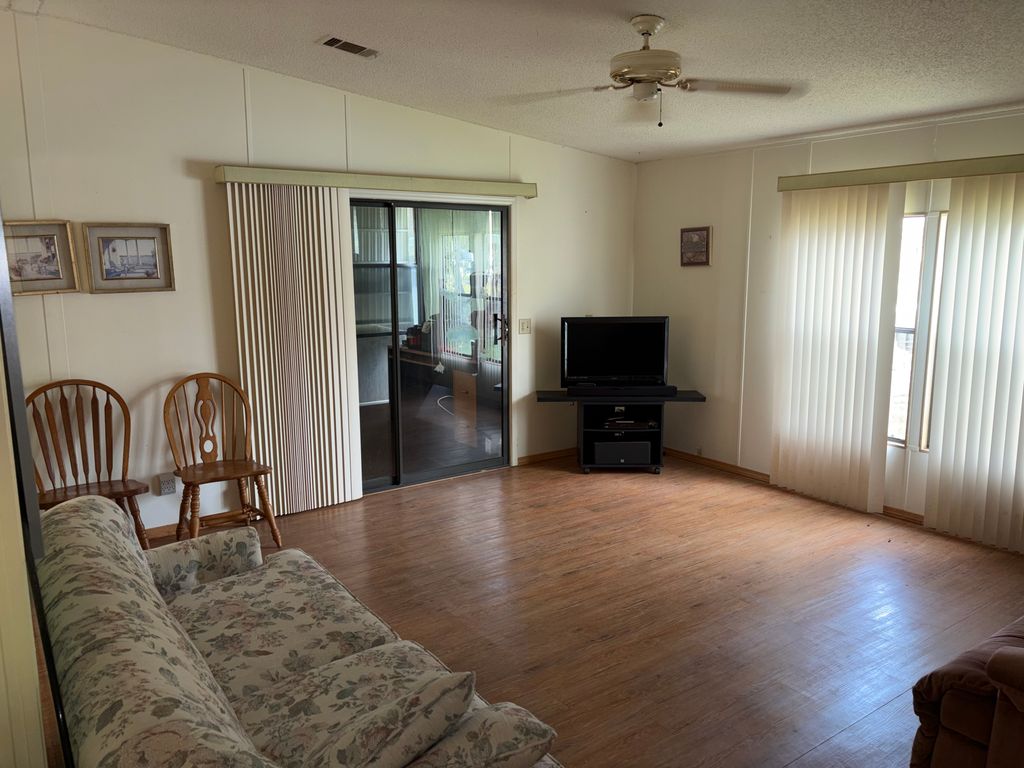 Photo of 4861 Spruce Creek Rd, Port Orange, FL 32127 (MLS # 11741399)