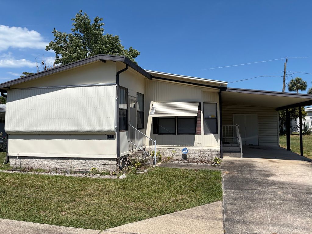 Photo of 4861 Spruce Creek Rd, Port Orange, FL 32127 (MLS # 11741399)