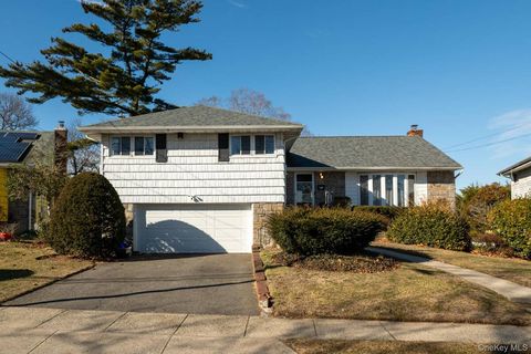 Photo of 21 Norton Drive, Roosevelt, NY 11575 (MLS # 11634246)