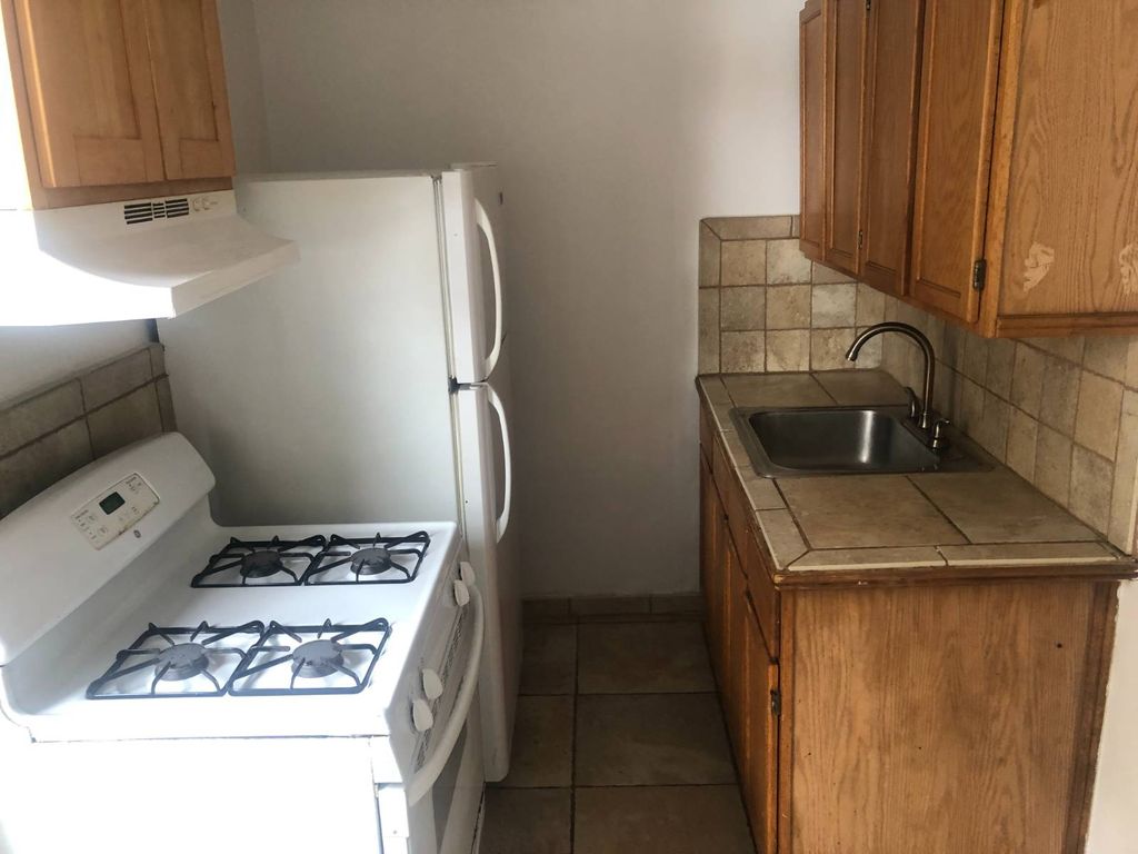 Photo of 124 Parrott Pl, Brooklyn, NY 11228 (MLS # 11619582)