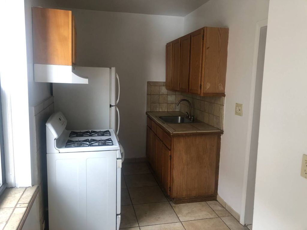 Photo of 124 Parrott Pl, Brooklyn, NY 11228 (MLS # 11619582)