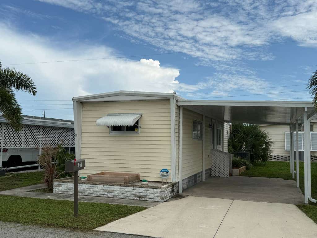 Photo of 31 Flores Dr, Palmetto, FL 34221 (MLS # 11920697)