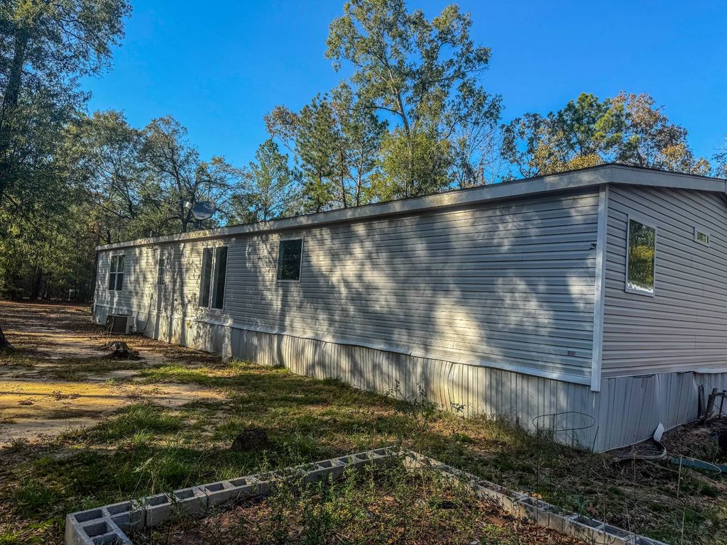 Photo of 128 Farm Hill Dr, Livingston, TX 77351 (MLS # 11651821)