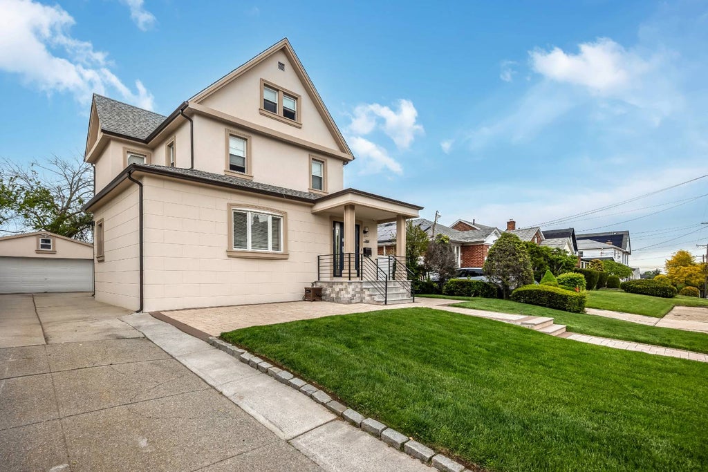 Photo of 1444 154 St, Whitestone, NY 11357 (MLS # 11866556)