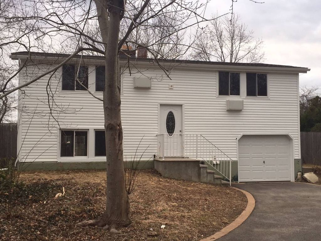 Photo of 68 University Heights Drive, Stony Brook, NY 11790 (MLS # 11740603)