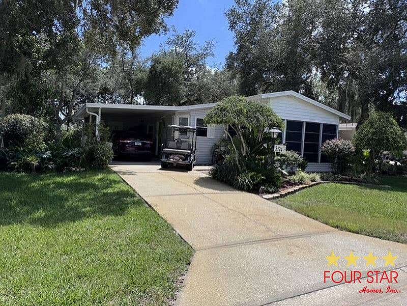 Photo of 3124 Hickory Tree Ln #234, DeLand, FL 32724 (MLS # 11933254)