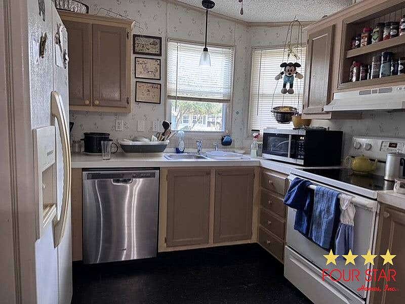 Photo of 3124 Hickory Tree Ln #234, DeLand, FL 32724 (MLS # 11933254)