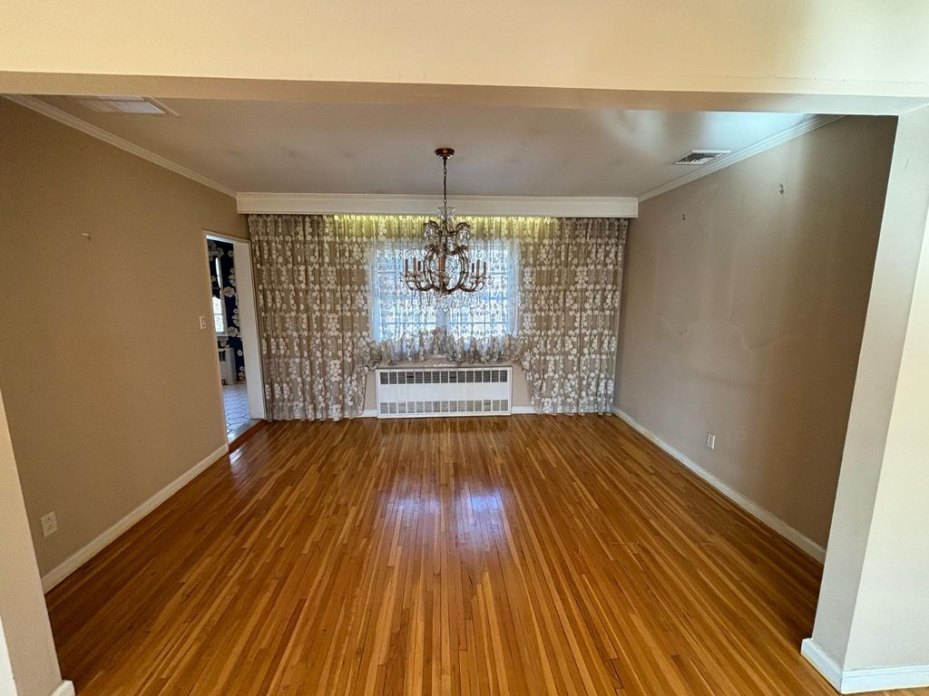 Photo of 890 Carol Ct, Woodmere, NY 11598 (MLS # 11640654)