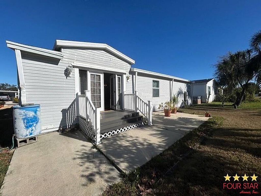 Photo of 369 Los Indios, Edgewater, FL 32441 (MLS # 11652444)