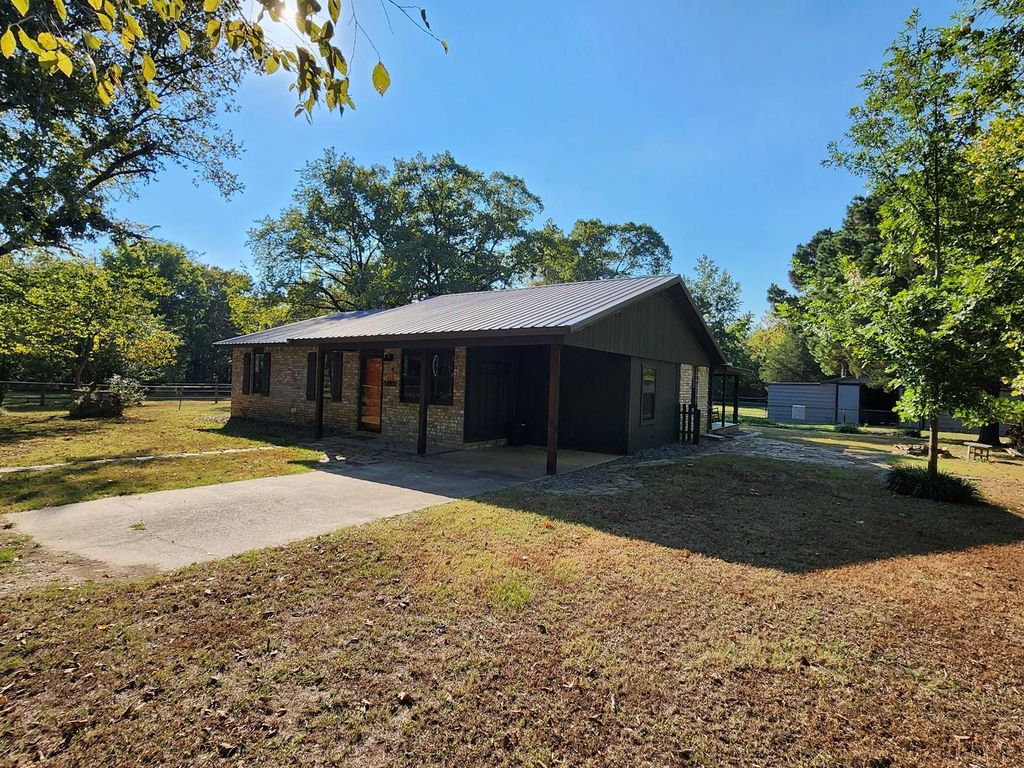 Photo of 10419 Blackfork Road, Heavener, OK 74937 (MLS # 11679124)