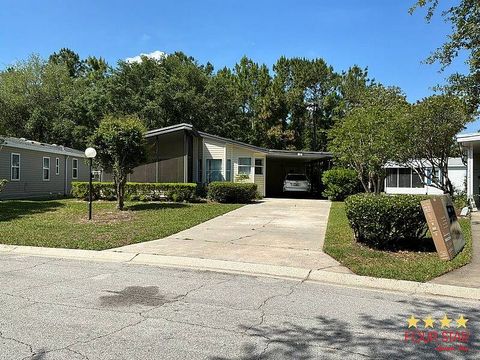 Photo of 12 Cypress Grove Ln, Ormond Beach, FL 32174 (MLS # 11741320)