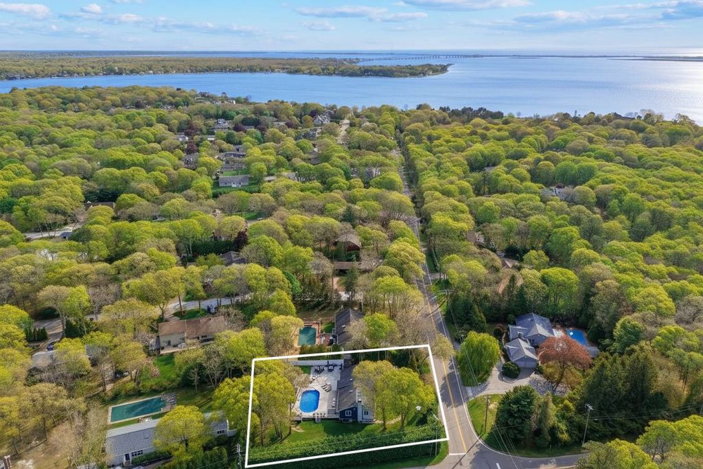 Photo of 18 Squires Ave, East Quogue, NY 11942 (MLS # 11742491)