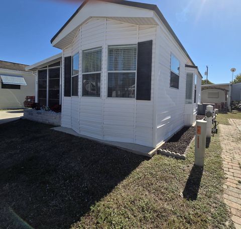 Photo of 17200 Pioneer St #E5-28, North Fort Myers, FL 33917 (MLS # 11632997)