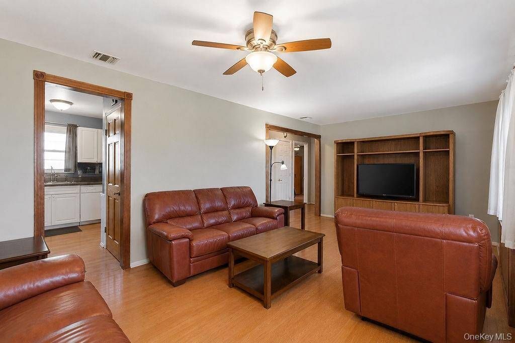 Photo of 89 Parliament Place, North Babylon, NY 11703 (MLS # 11745179)