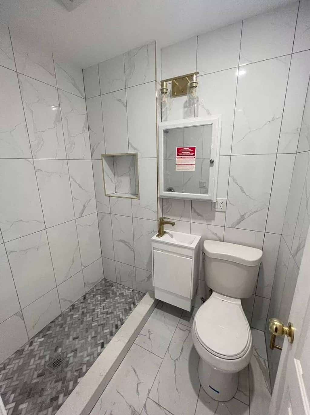 Photo of 11310 Jamaica Ave, New York, NY 11418 (MLS # 11878328)