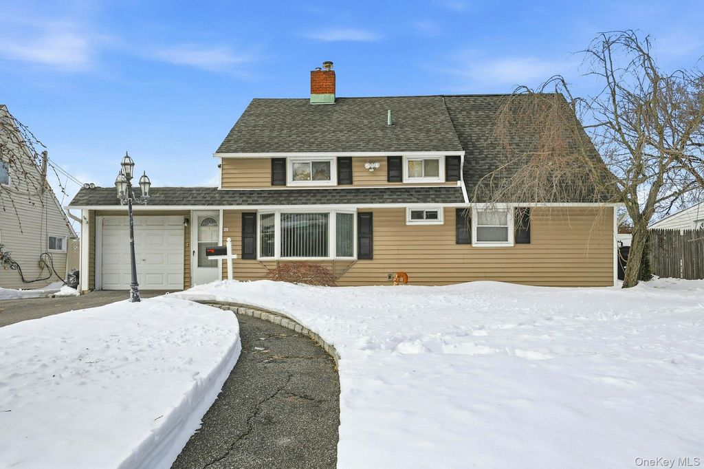 Photo of 23 Elm Drive W Dr, Levittown, NY 11756 (MLS # 11651254)