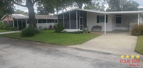 Photo of 973 Navel Orange Dr, Orange City, FL 32763 (MLS # 11644299)