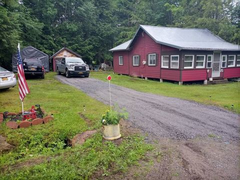 Photo of 136 Lake Ave, Caroga Lake, NY 12032 (MLS # 11662215)