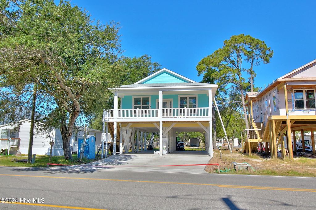 Photo of 6926 Beach Drive SW, Ocean Isle Beach, NC 28469 (MLS # 100409631)